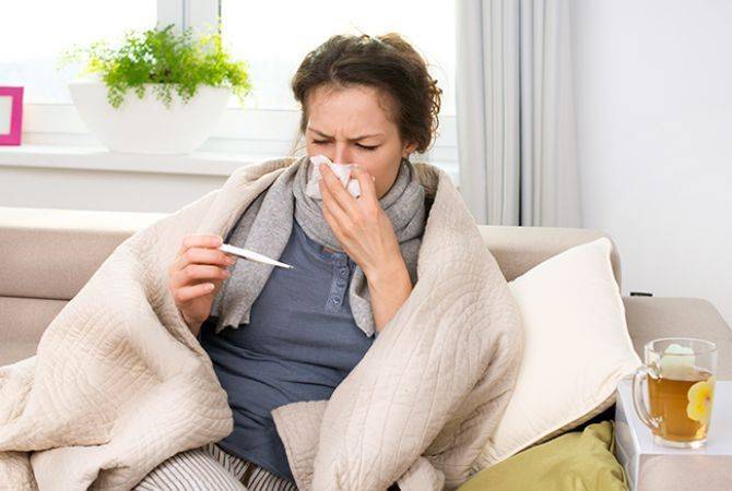 woman-sneezing-with-acute-respiratory-infections